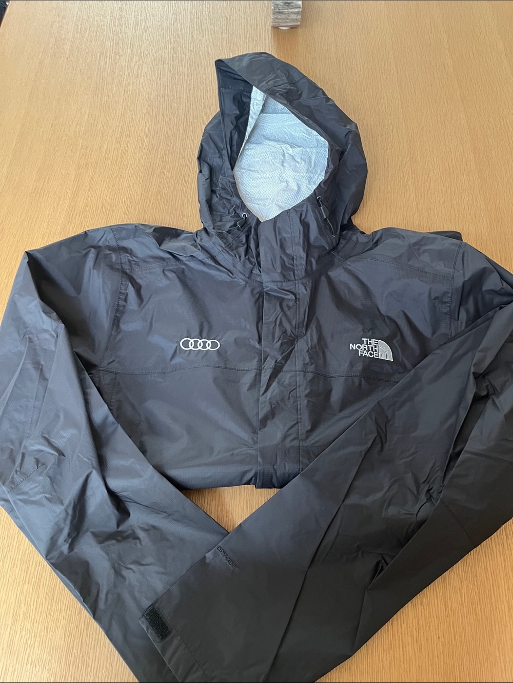The North Face Black Hooded Rain Shell with Logo